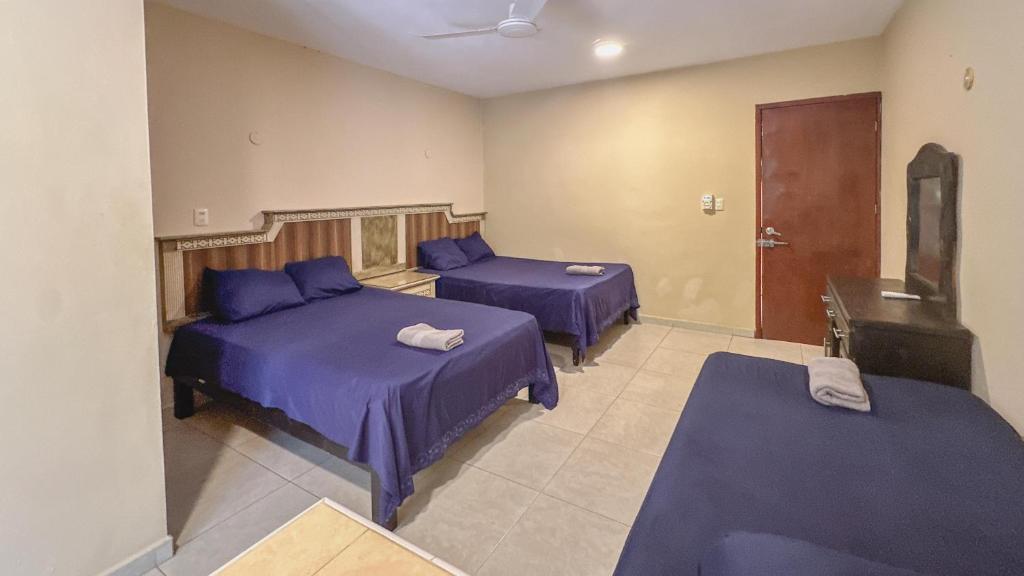 Postel nebo postele na pokoji v ubytování Casa Daniels Guesthouse