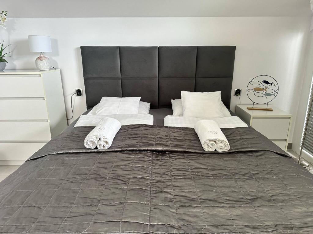 Posteľ alebo postele v izbe v ubytovaní Willa Dobryłko II -Apartamenty