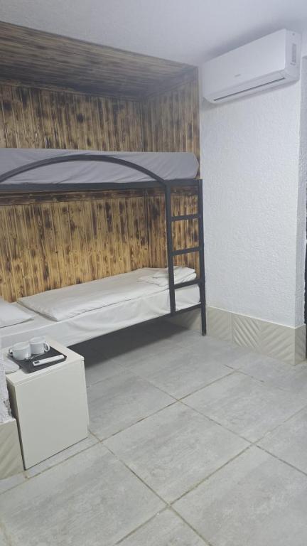 Postel nebo postele na pokoji v ubytování Kai Hotel Bar