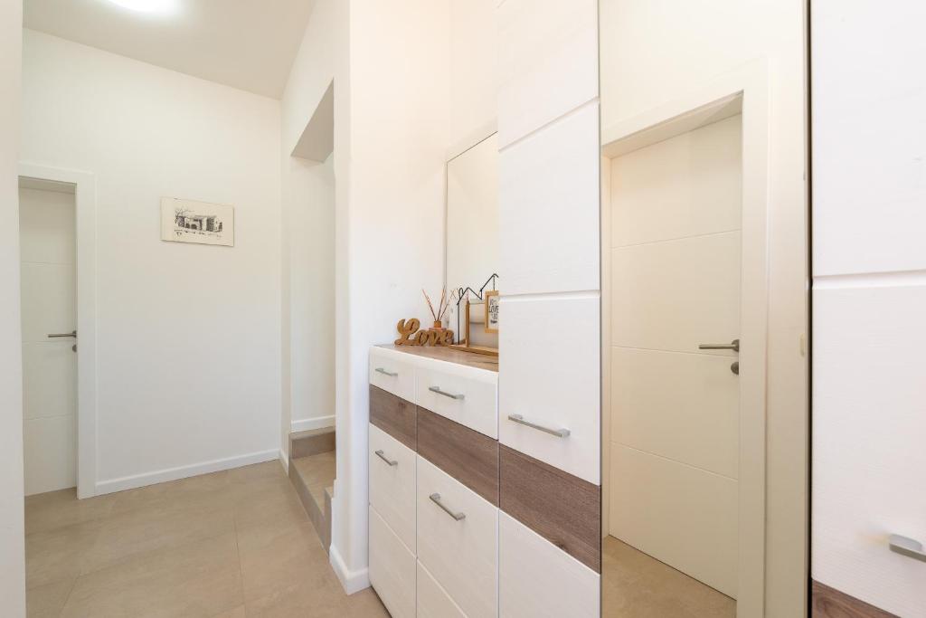 Kuchyň nebo kuchyňský kout v ubytování Nelly Apartments