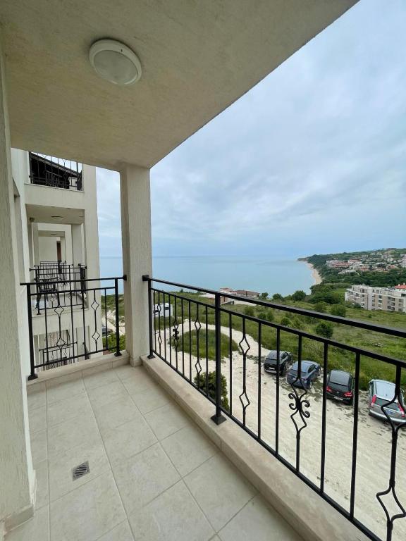 a balcony with a view of the ocean at Fortuna Cape 4 apartment in Byala