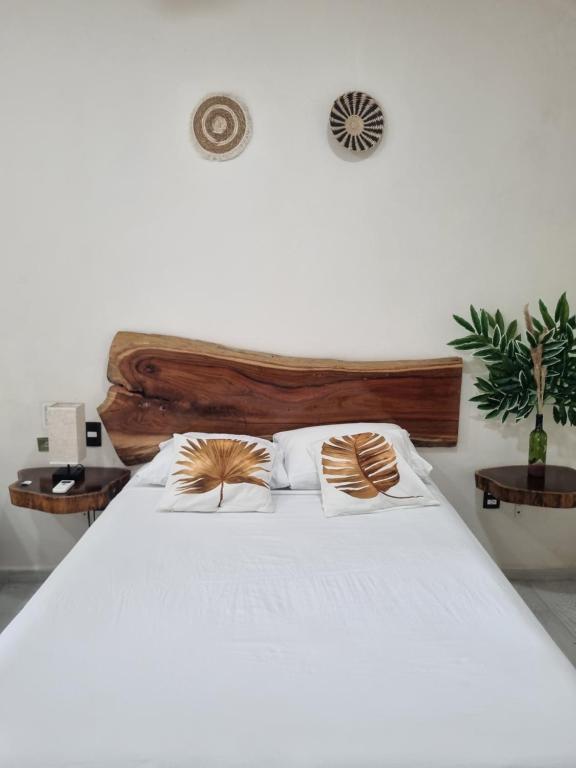 Postel nebo postele na pokoji v ubytování Hotel Brisas Bacalar