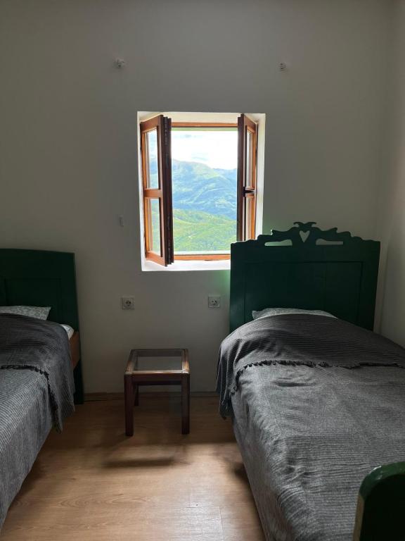 Postel nebo postele na pokoji v ubytování Kota 1120