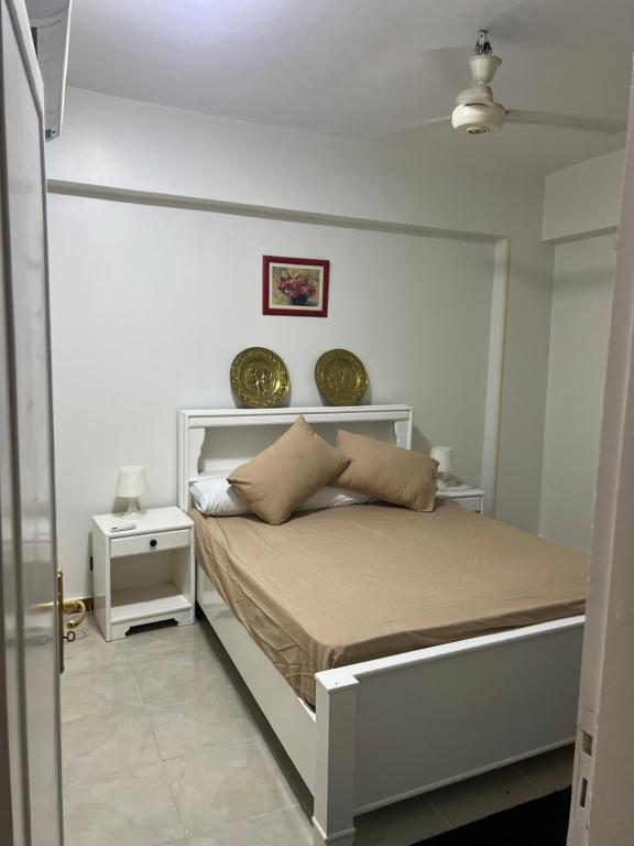 Postel nebo postele na pokoji v ubytování Mohamed Home