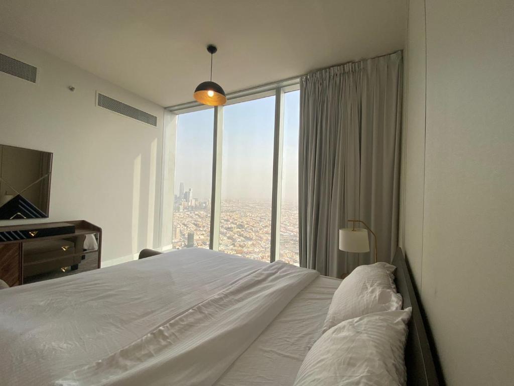 En eller flere senge i et værelse på Rafal Tower by JW Marriott برج رافال