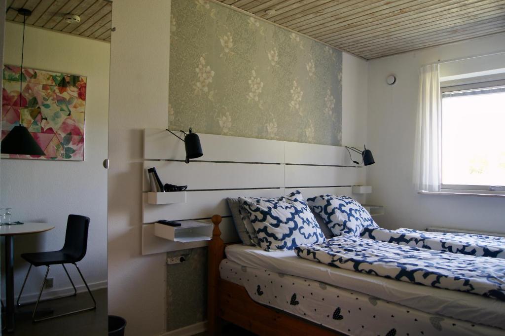 Postel nebo postele na pokoji v ubytování Hine Bakke Bed And Breakfast