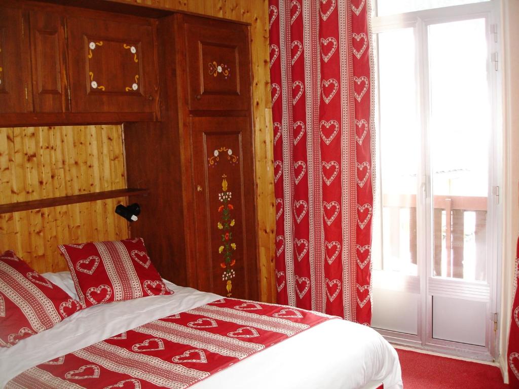 Postel nebo postele na pokoji v ubytování Hôtel Le Grand-Bec