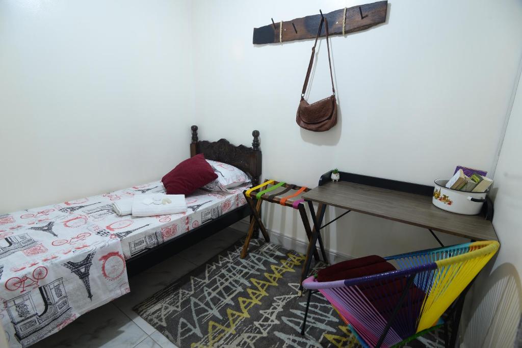 Postel nebo postele na pokoji v ubytování Antigua Hostal