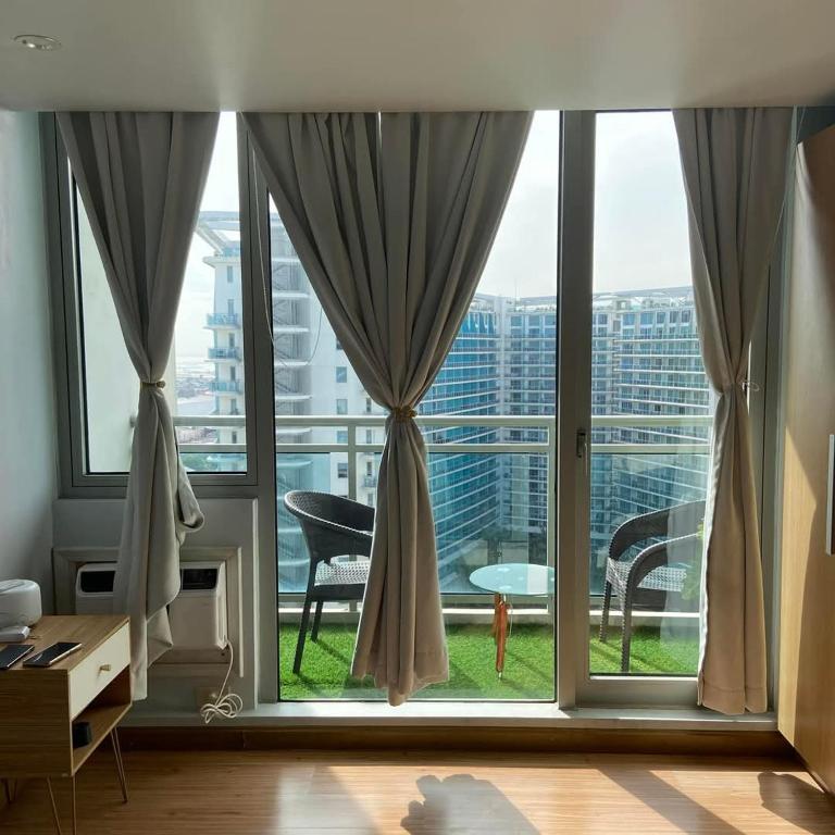 Posezení v ubytování Azure Miami Tower - Mirage Cabin