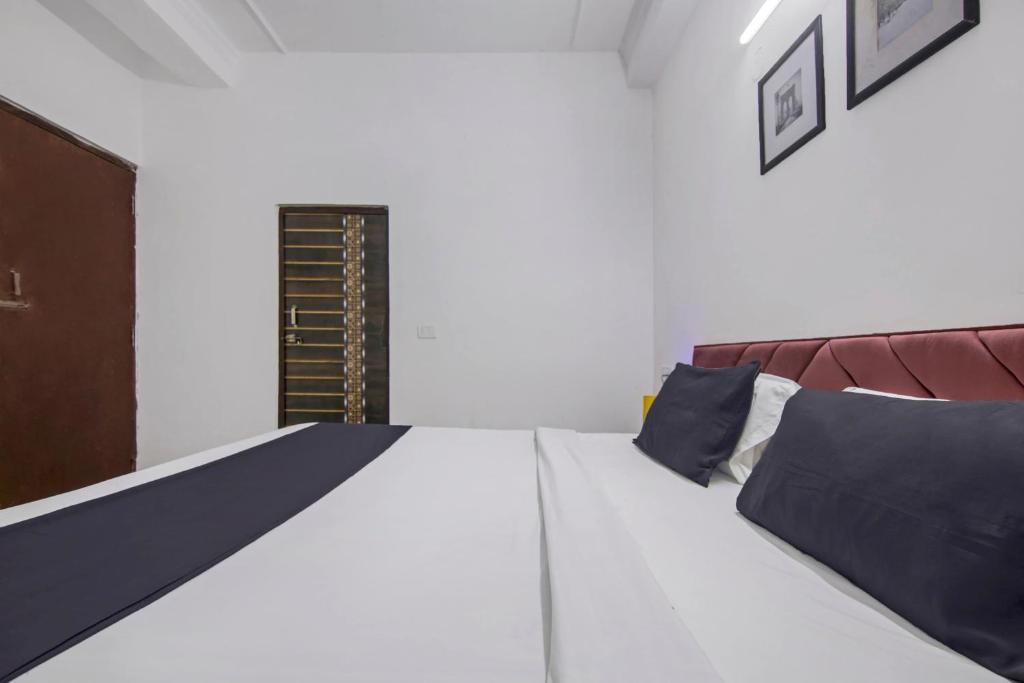 Postel nebo postele na pokoji v ubytování Hotel O Relax Inn