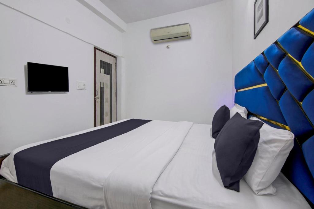 Postel nebo postele na pokoji v ubytování Hotel O Relax Inn