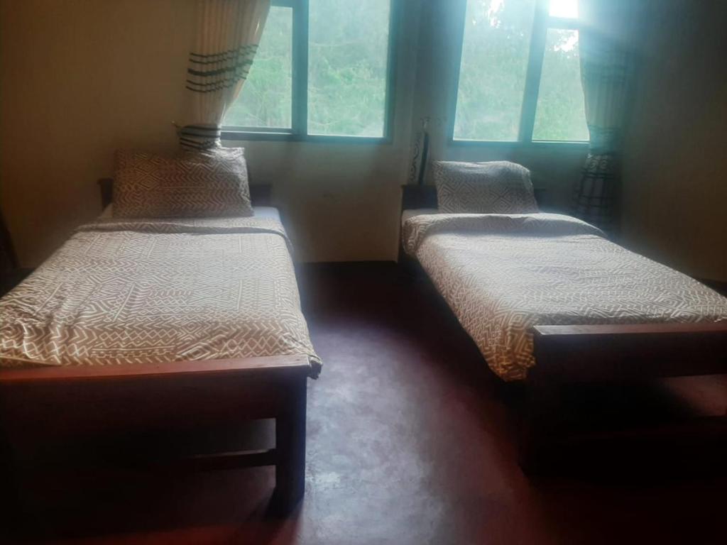 Voodi või voodid majutusasutuse Misty Mount Hostel toas