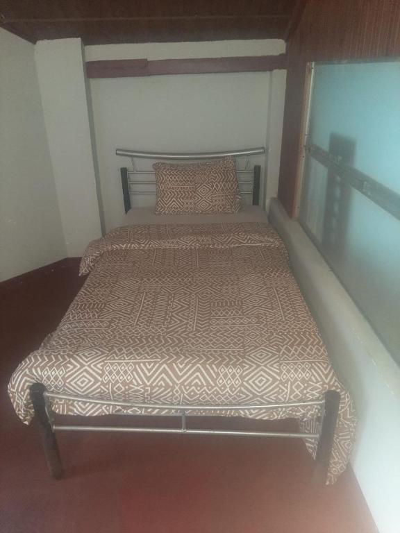 Voodi või voodid majutusasutuse Misty Mount Hostel toas