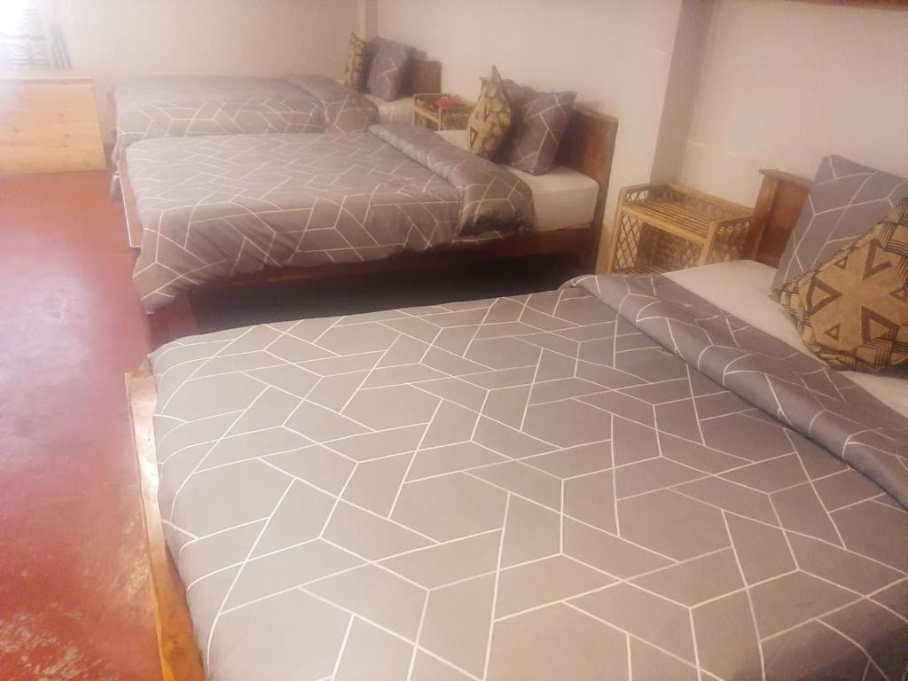 Voodi või voodid majutusasutuse Misty Mount Hostel toas