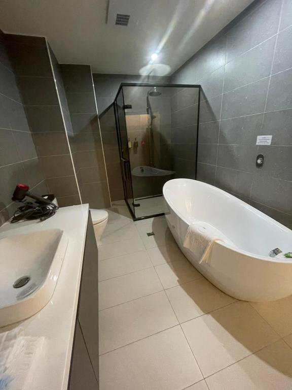 Koupelna v ubytování Jiati Business Motel
