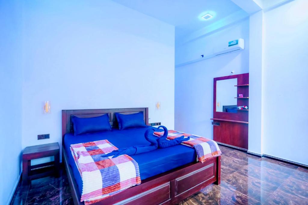 Postel nebo postele na pokoji v ubytování Oval Bay Resort