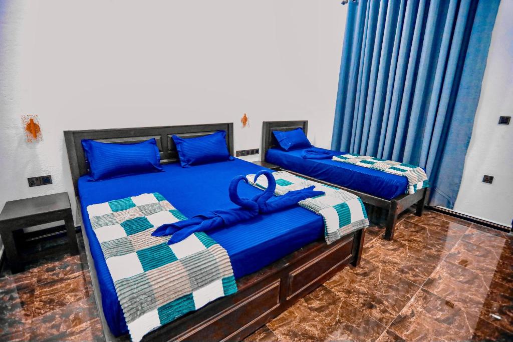 Postel nebo postele na pokoji v ubytování Oval Bay Resort