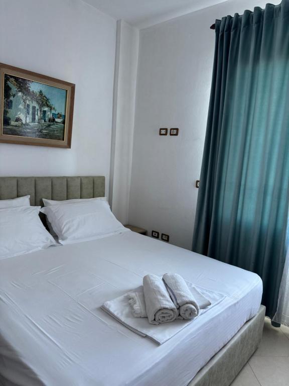 Postel nebo postele na pokoji v ubytování KuneVain Guest House