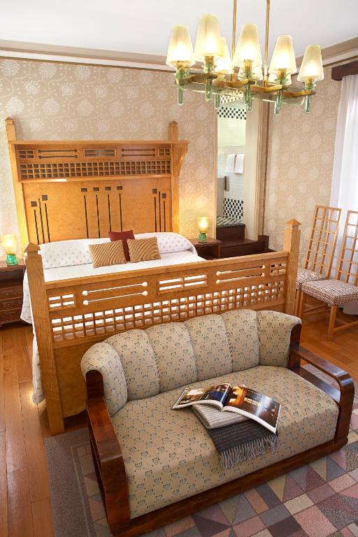 Postel nebo postele na pokoji v ubytování Hotel Saturnia & International