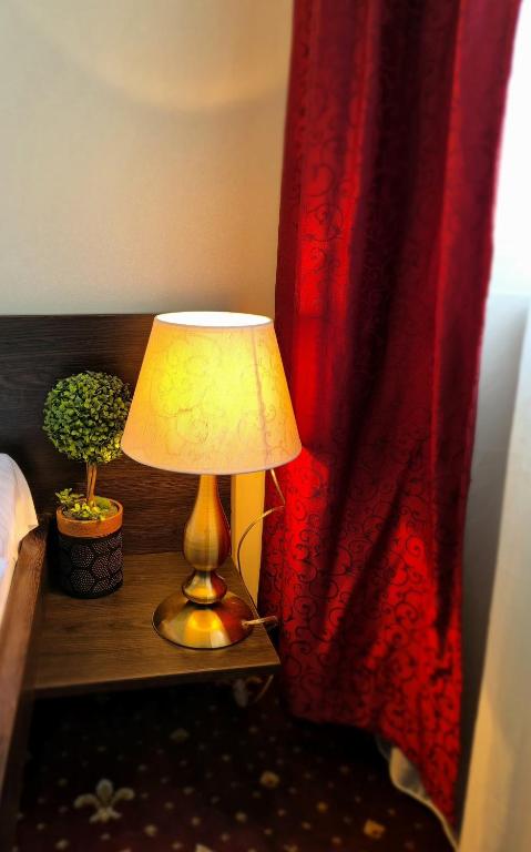 Postel nebo postele na pokoji v ubytování Hotel Marie