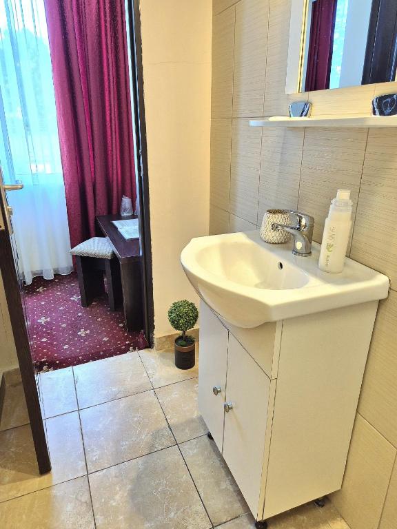 Koupelna v ubytování Hotel Marie