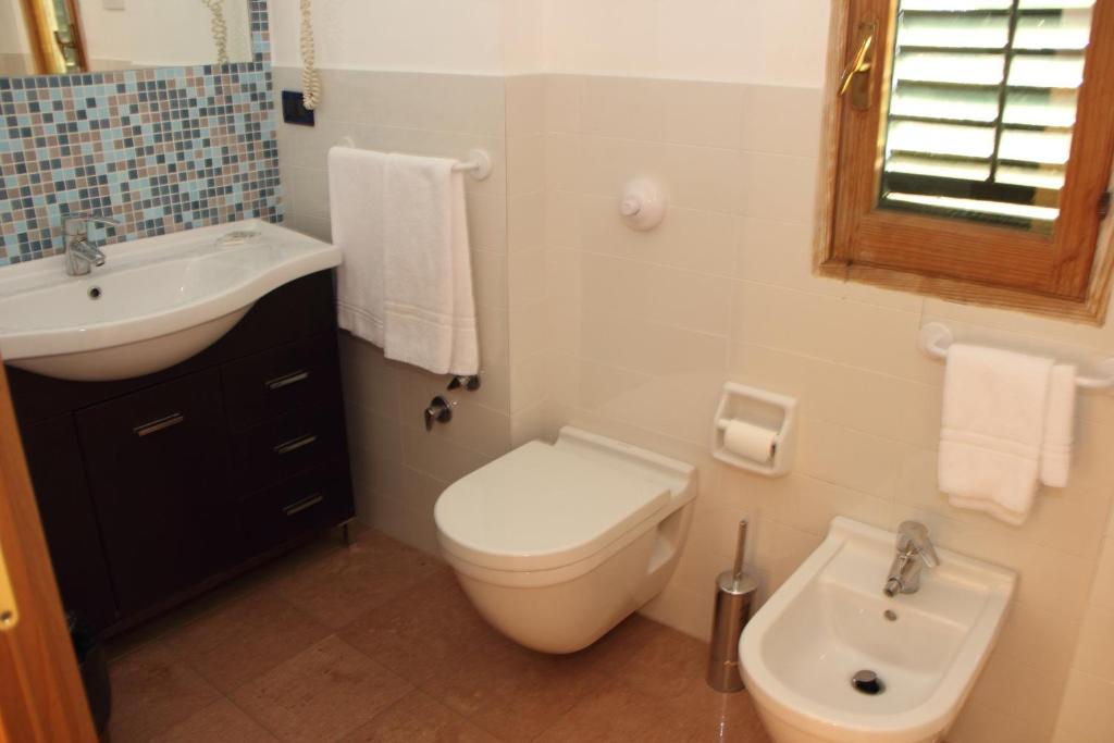 Koupelna v ubytování Hotel Villa Archirafi