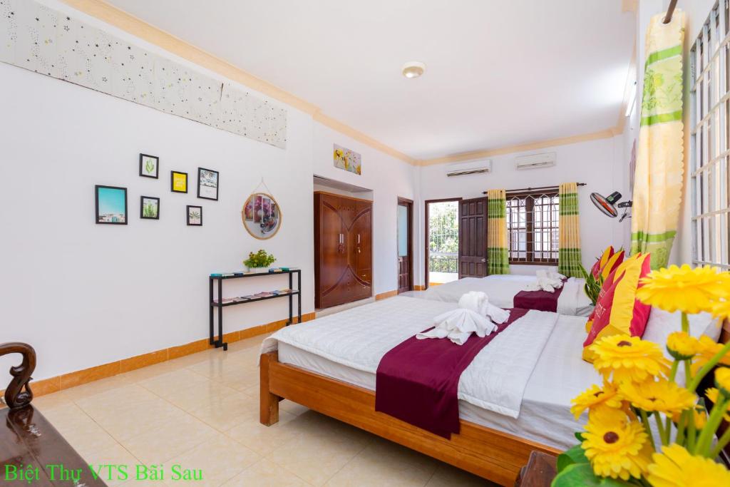 Postel nebo postele na pokoji v ubytování Biệt thự Hồ Full TIỆN ÍCH VT Xanh