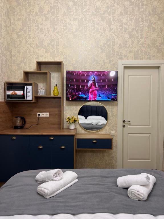 Postel nebo postele na pokoji v ubytování Albatross Luxe Hotel