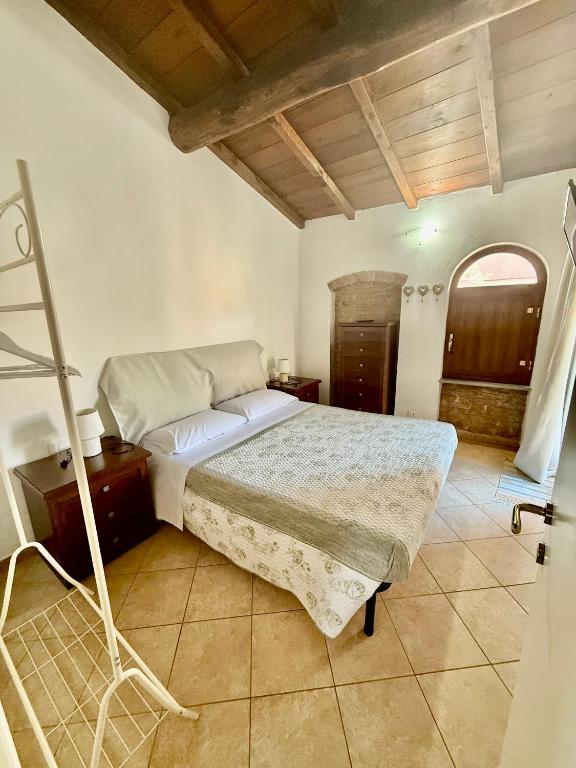Posteľ alebo postele v izbe v ubytovaní Casa vacanze Elena