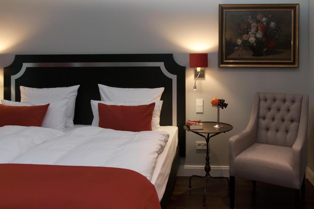 Postel nebo postele na pokoji v ubytování Hotel im Hof
