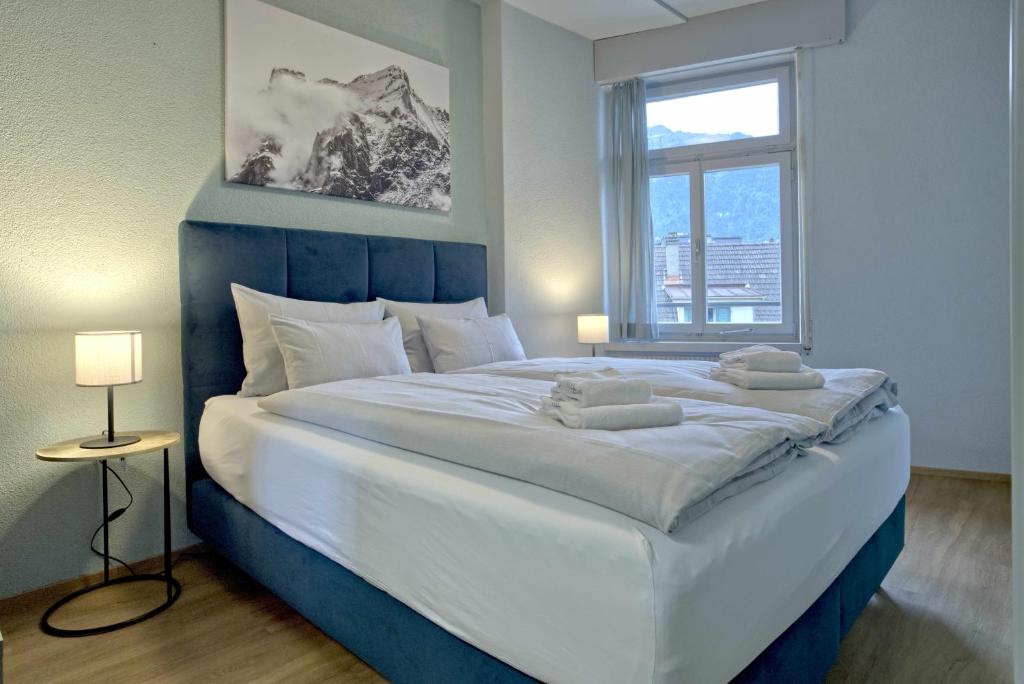 Postel nebo postele na pokoji v ubytování BANK House Apartment L 305 - GRIWA RENT