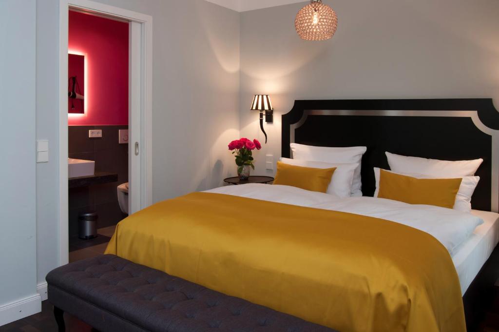 Postel nebo postele na pokoji v ubytování Hotel im Hof