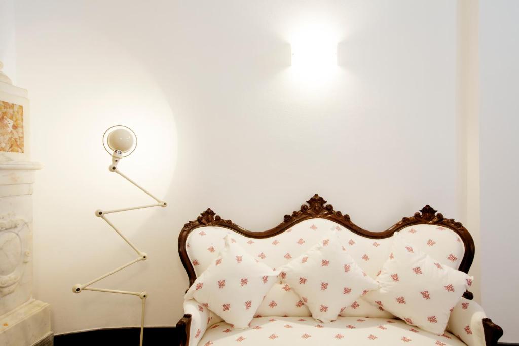 A bed or beds in a room at La Madonetta - Dimora d'epoca -