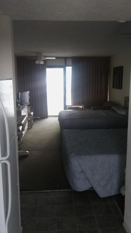 Ein Bett oder Betten in einem Zimmer der Unterkunft David&#39;s Landing