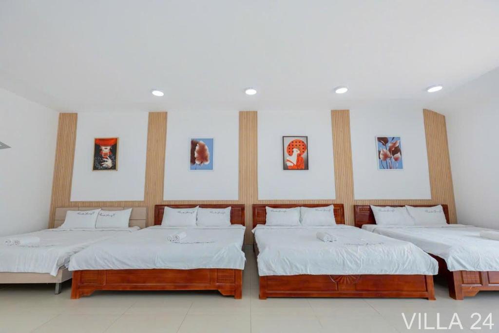 Postel nebo postele na pokoji v ubytování Villages Bãi Sau Vũng Tàu OCEAN 24 Gần Biển
