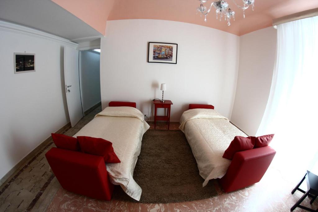 Postel nebo postele na pokoji v ubytování Gualtiero Camere & Suite