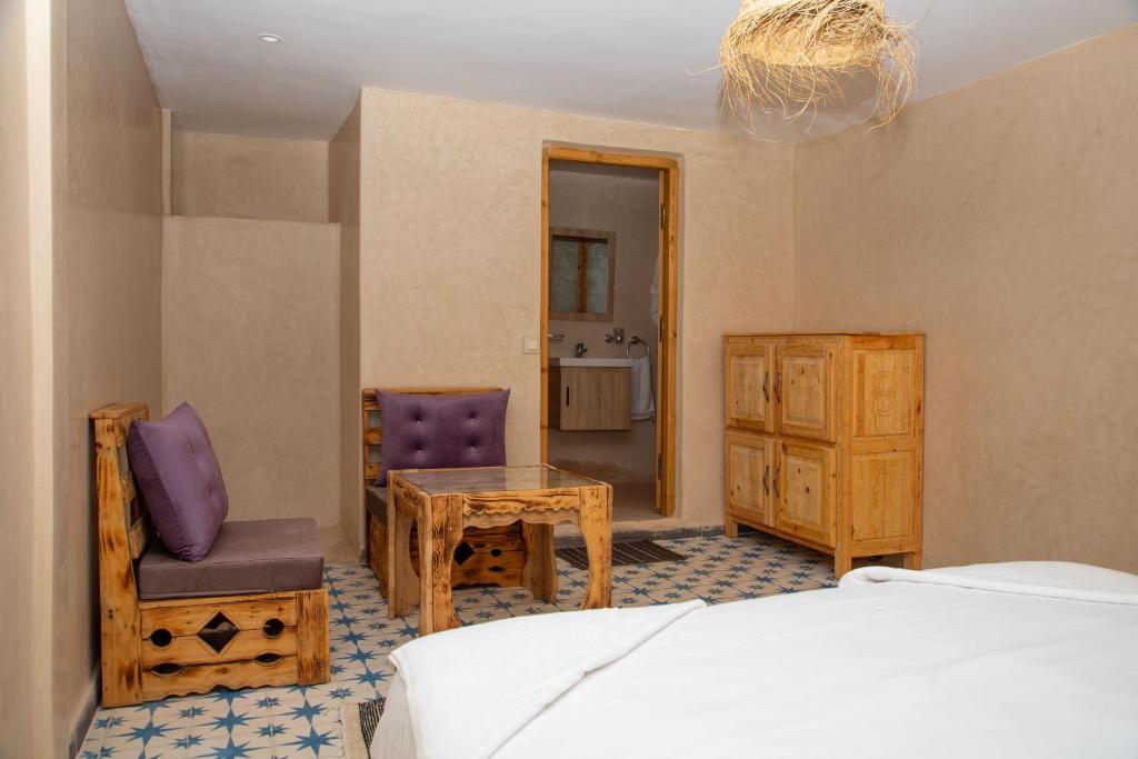 Postel nebo postele na pokoji v ubytování Single fin taghazout surf & stay