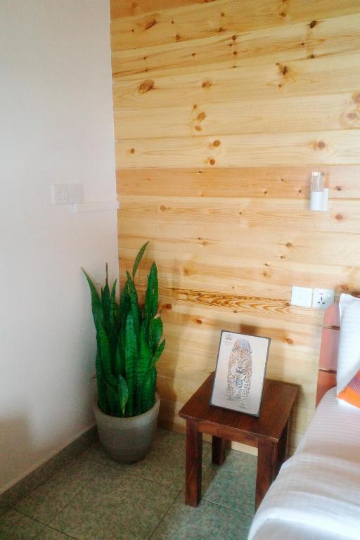 Postel nebo postele na pokoji v ubytování Will Guest Homestay