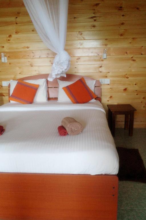 Postel nebo postele na pokoji v ubytování Will Guest Homestay