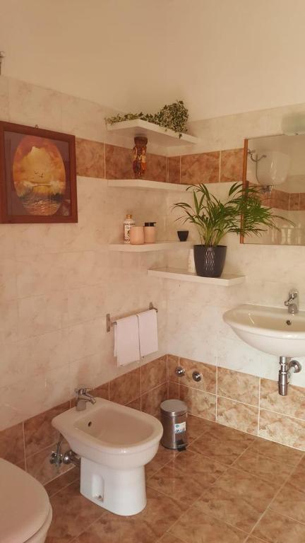 Koupelna v ubytování FalcoBianco GuestHouse