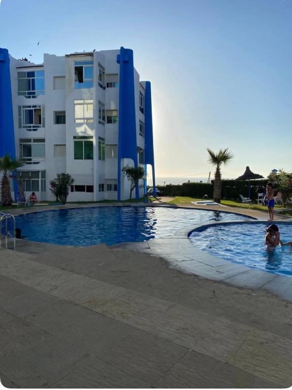 Bazén v ubytování Assilah, briech logement vue sur mer nebo v jeho okolí
