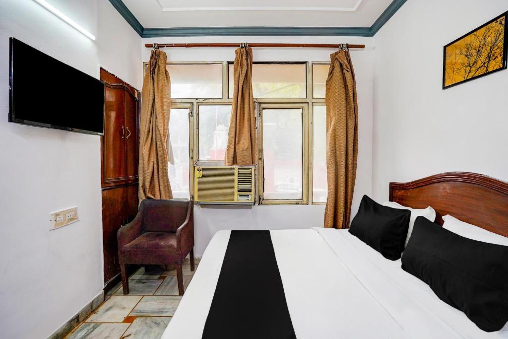 TV a/nebo společenská místnost v ubytování Hotel O Iconic Residency