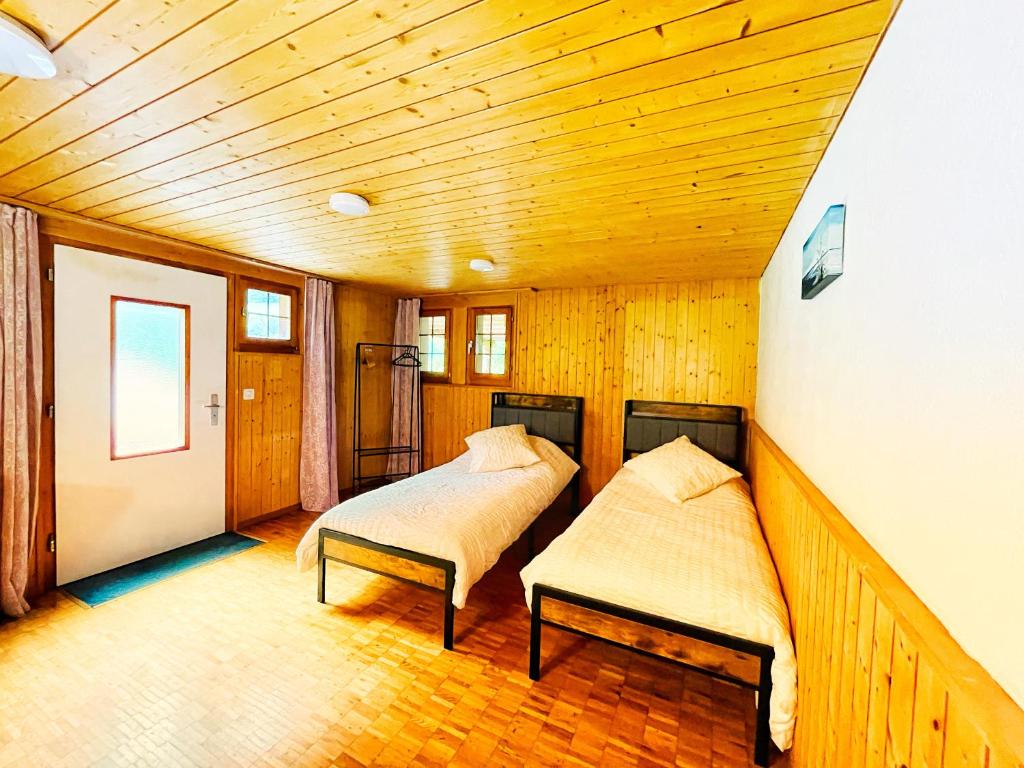 Postel nebo postele na pokoji v ubytování Gästehaus Milital