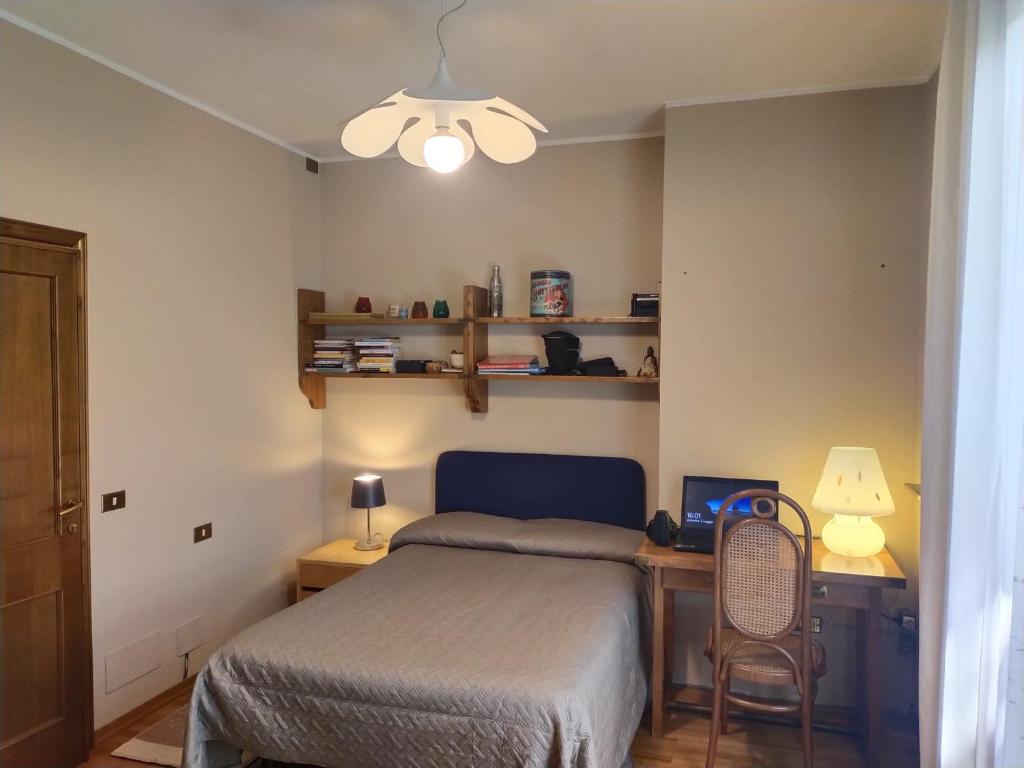 Postel nebo postele na pokoji v ubytování B&B Paolo e Francesca