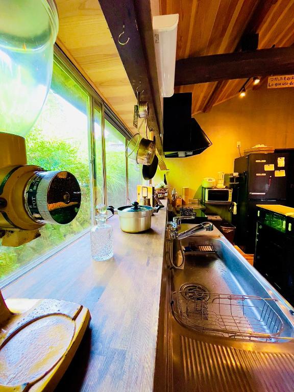 Kuchyň nebo kuchyňský kout v ubytování Homestay HANIHOHETO