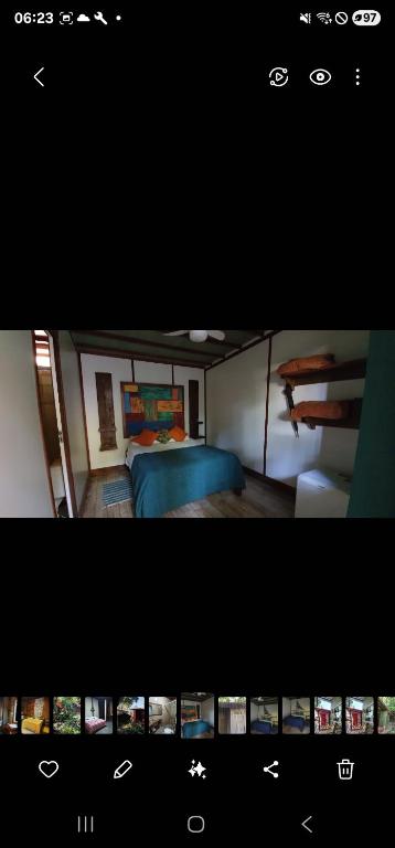 two pictures of a bedroom with a bed and a room with at Pousada Cabanas Paraiso in Ilha Grande