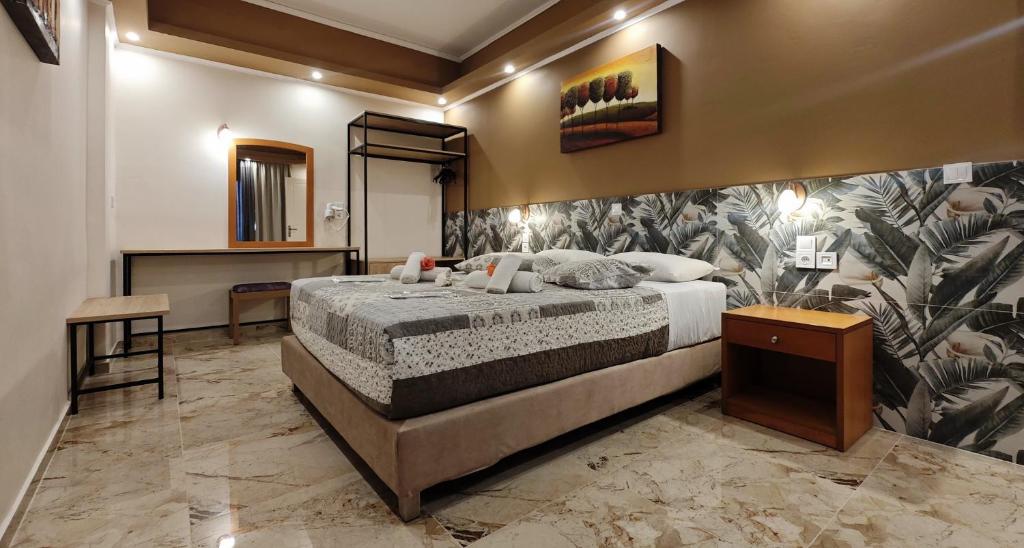 Postel nebo postele na pokoji v ubytování Hotel Marilena