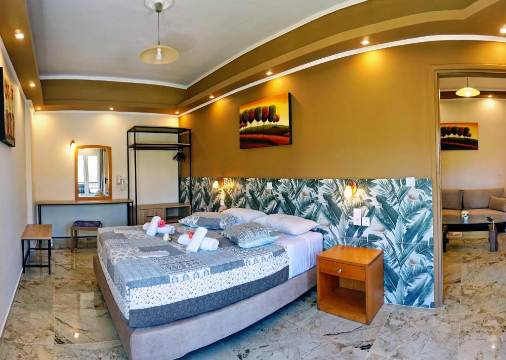 Postel nebo postele na pokoji v ubytování Hotel Marilena
