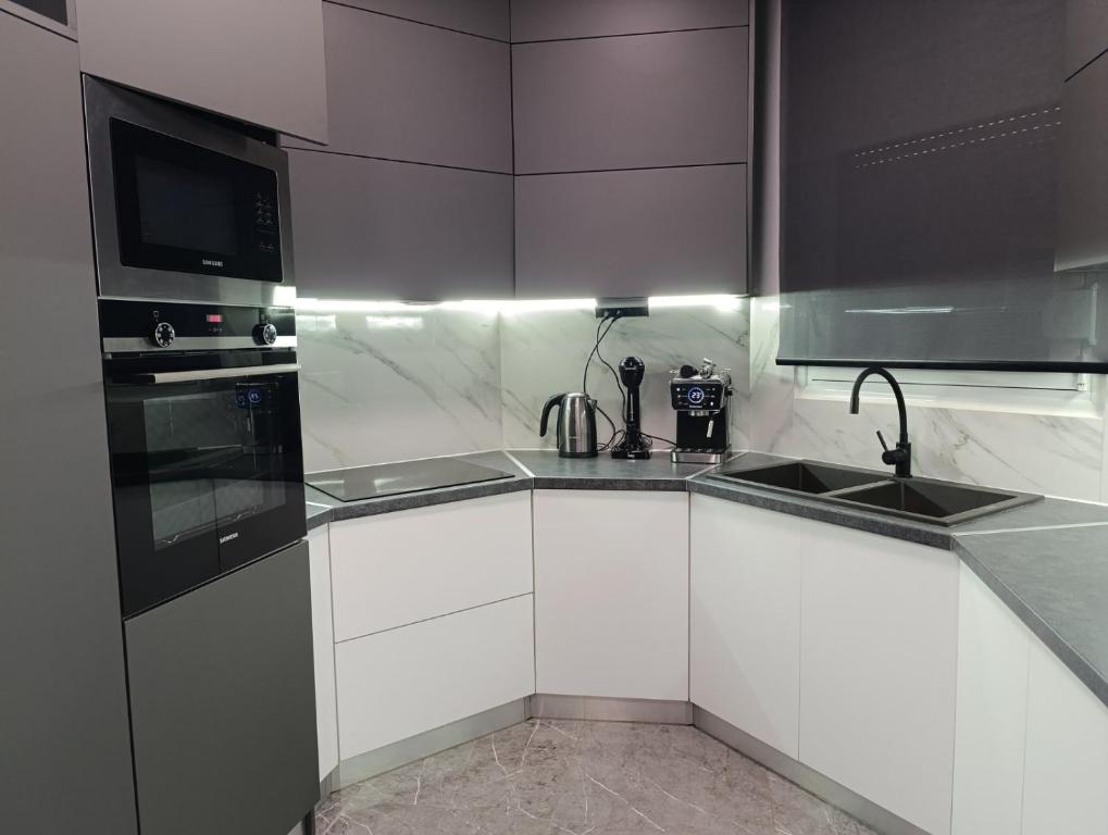 Kuchyň nebo kuchyňský kout v ubytování Sountou home
