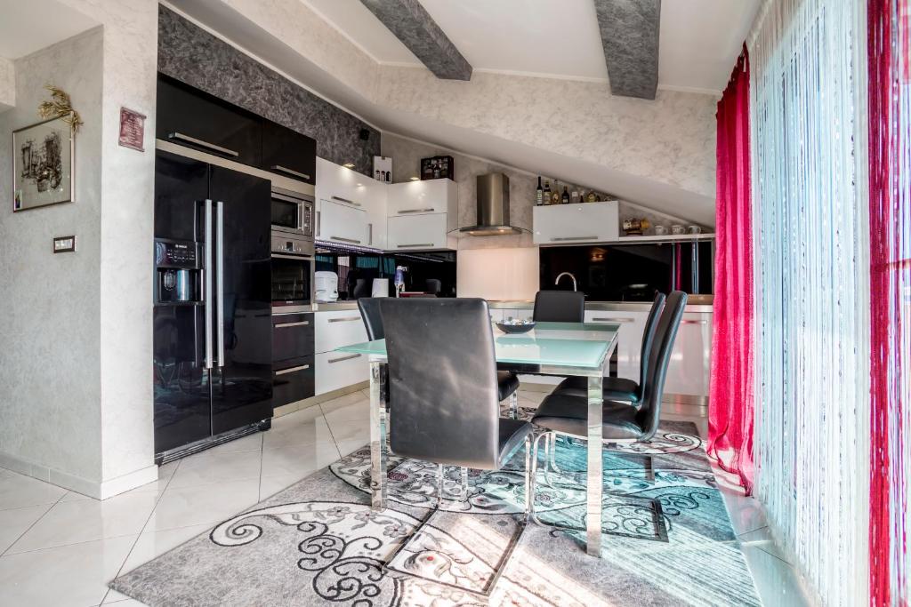 Kuchyňa alebo kuchynka v ubytovaní Apartment Alduk